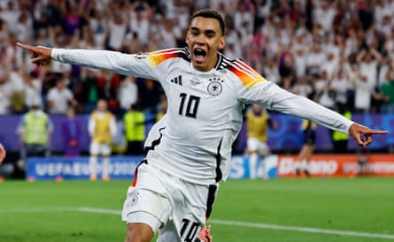 Jamal Musiala enjoys the moment after putting Germany 2-0 up against Denmark in their Euro 2024 last-16 game.