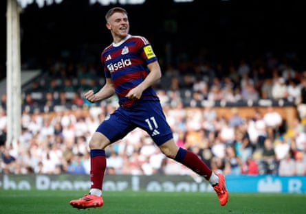 Harvey Barnes celebrates scoring for Newcastle at Fulham