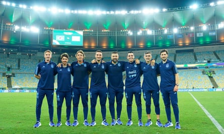 Matías Manna (left) and poses alongside the Argentina head coach, Lionel Scaloni (fourth left), and the rest of the coaching team after their team’s victory over Brazil in their 2026 World Cup qualifier at Maracana Stadium in November 2023.