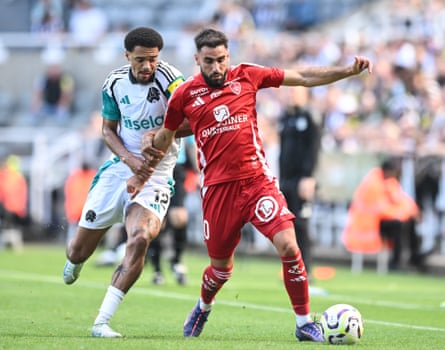 Romain Del Castillo holds off Newcastle’s Jamal Lewis during their pre-season friendly.