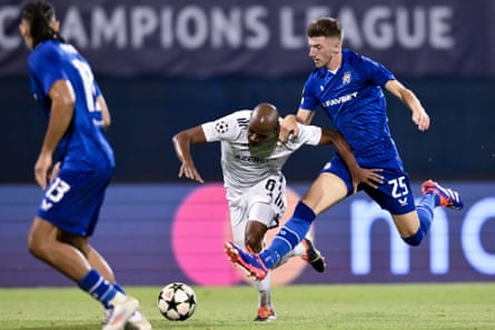 Petar Sucic nicks the ball away from Júlio Romão of Qarabag during the Champions League playoff.