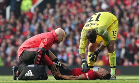 Jesse Lingard receives treatment on an injury despite himself coming off the bench to replace Juan Mata