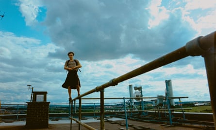 A man standing on piping in Bird. 