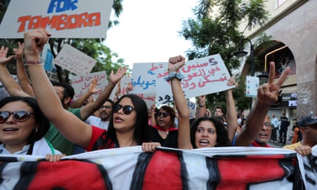 People take part in a protest against President Saied.