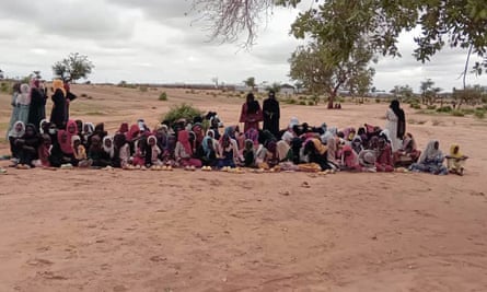 Children receiving lessons from fellow refugees at the Farchana camp.