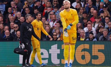 Jota scrapes leaders Liverpool past Palace but Alisson exits with injury