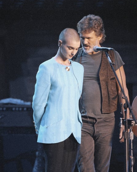 Kris Kristofferson comforts Sinéad O’Connor after she was booed off stage during the Bob Dylan anniversary concert at Madison Square Garden, in 1992.