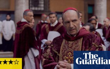 Conclave review – Ralph Fiennes shines as papal election results in high-camp gripper