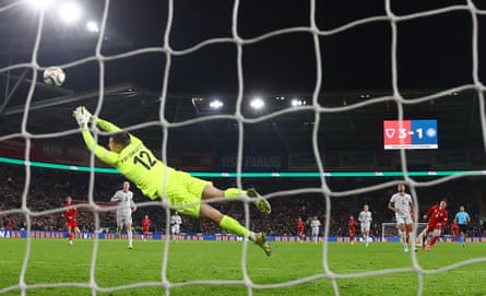 Harry Wilson (right) scores Wales’s fourth goal against Iceland in midweek