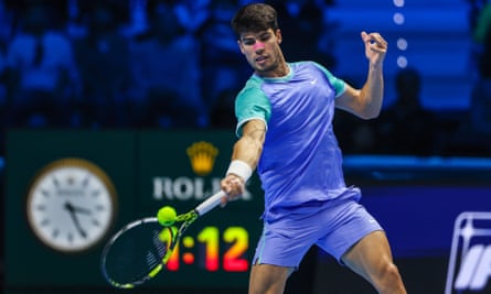 Carlos Alcaraz plays a forehand shot.