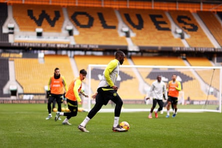 Toti Gomes of Wolves runs with the ball during the  Halloween open training session