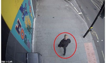 CCTV footage of Callum Parslow walking along a road, with his image circled in red