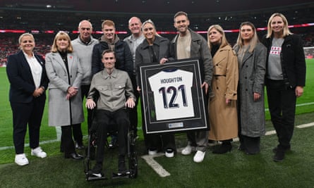 Stephen Darby (in wheelchair) is among those posing with Steph Houghton and her commemorative shirt before last month’s friendly against Germany at Wembley