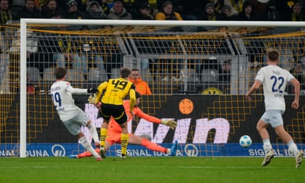 Hoffenheim’s Jacob Bruun Larsen (left) equalises against late on against Borussia Dortmund