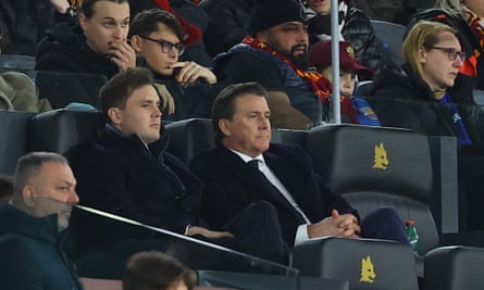 Dan and Ryan Friedkin sitting in the stands watching Roma play Hellas Verona in January