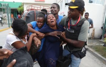 Two reporters and a police officer killed in shooting at Haiti hospital reopening