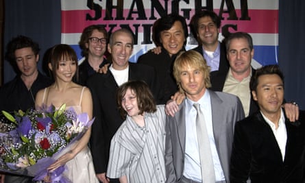 A young Aaron Taylor-Johnson (centre) with the cast and crew of Shanghai Knights at its premiere in 2003