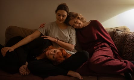 Carrie Coon, right, with Natasha Lyonne and Elizabeth Olsen in His Three Daughters.