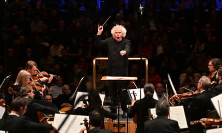 Rattle conducting the LSO at the Barbican, March 2024.