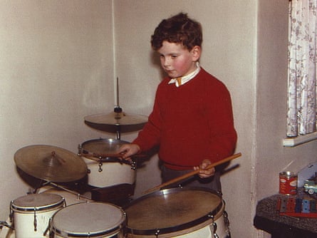 A young Rattle on the drums.