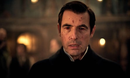 Claes Bang with blood flecks on his face in the 2020 miniseries Dracula