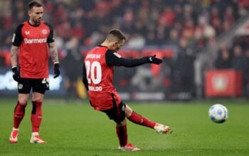 European football: 10-man Holstein Kiel seal win over Dortmund with 45-yarder