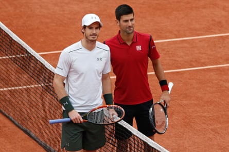 Novak Djokovic, right, and Andy Murray pose for a picture at the net before the final of the 2016 French Open