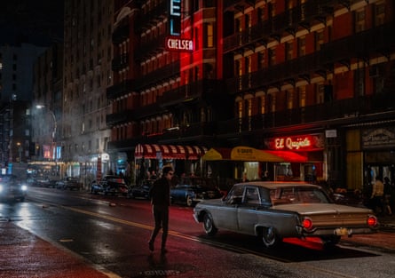 Timothée Chalamet walks past the Chelsea hotel in A Complete Unknown.