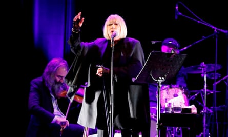 Marianne Faithfull singing on stage.