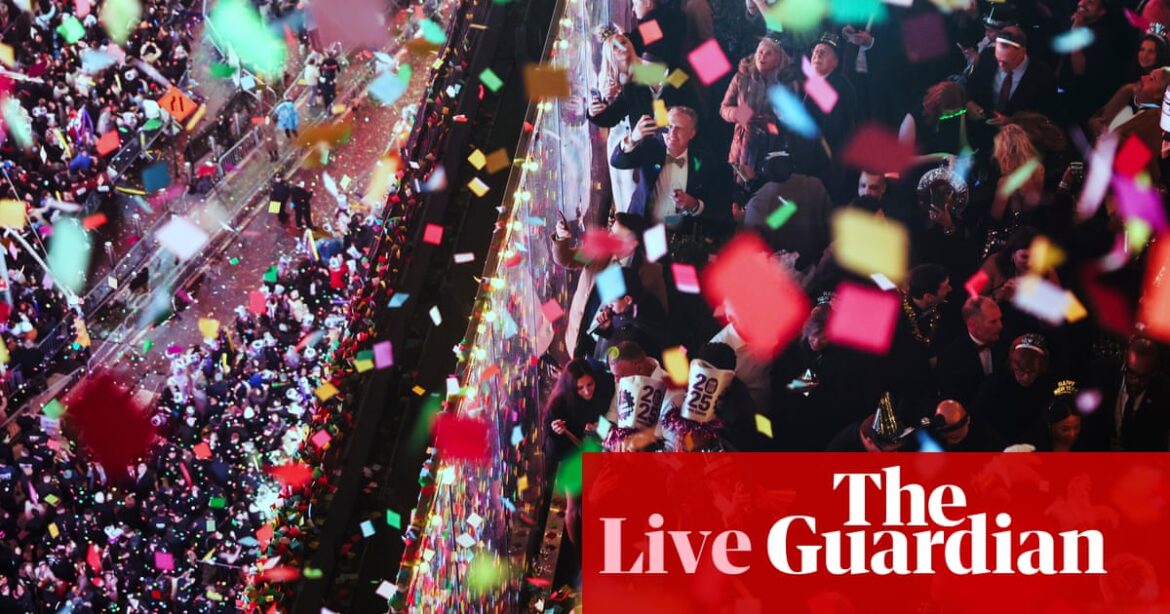 New Year’s Eve: ball drops in New York’s Times Square as celebrations take place across the globe – as it happened