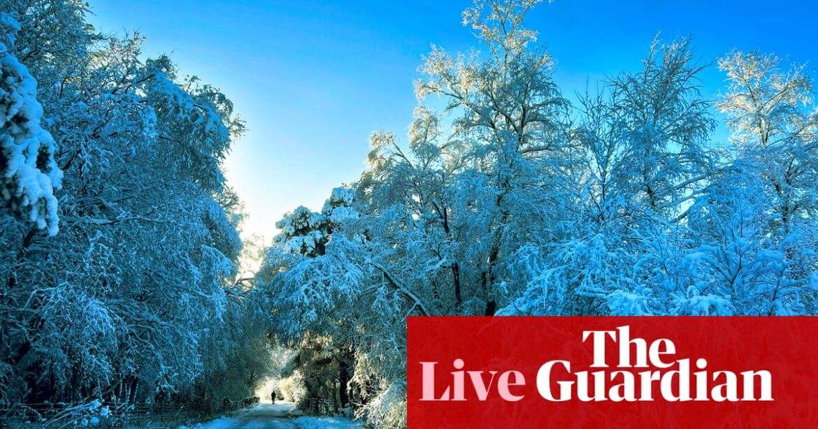 Parts of UK disrupted as snow and freezing rain arrive – live