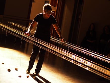 Ellen Fullman performing with her Long String Instrument.