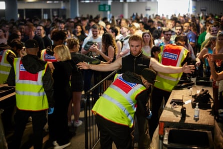 Security checking thousands of clubbers at the door.