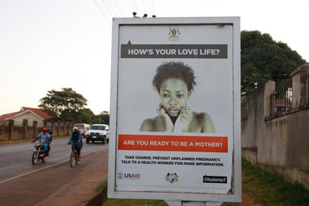 A poster showing a worried woman at the edge of a road.