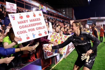 Mary Earps greets adoring Manchester United fans