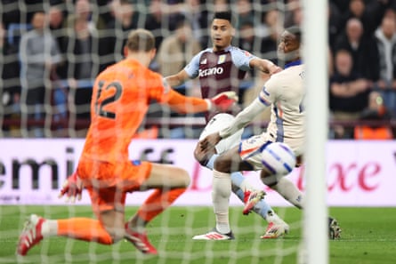 Chelsea’s Filip Jörgensen saves a shot by Ollie Watkins of Aston Villa.