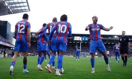 Maxence Lacroix of Crystal Palace (right) celebrates after Daniel Muñoz scored against Fulham.