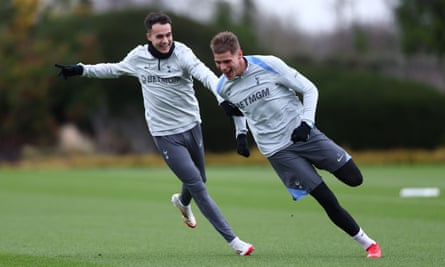 Tottenham’s Sergio Reguilón and Micky Van De Ven have some fun during a training session