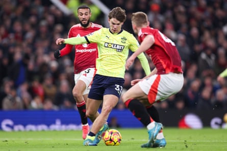 Dibling, with his trademark low socks, takes on Manchester United’s Matthijs de Ligt at Old Trafford this season.