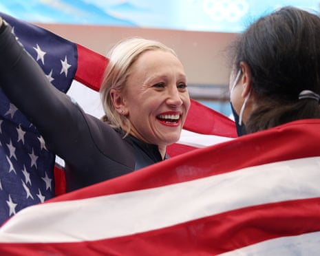 Kaillie Humphries celebrates her Olympic monobob gold medal at the 2022 Winter Olympics in Beijing.