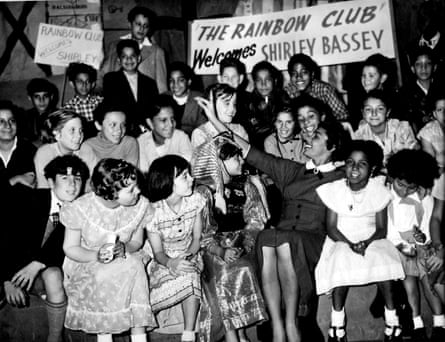 Shirley Bassey sings to members of the Bute Street Rainbow Club, Cardiff, in 1957.