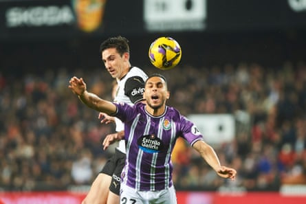 Valencia’s César Tárrega (left) challenges Anuar Mohamed