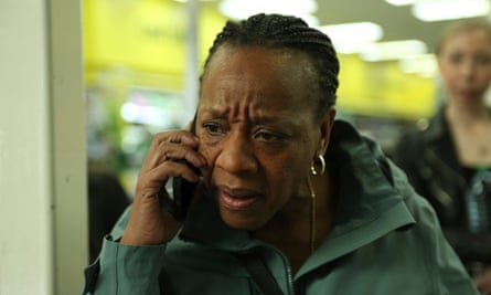 Marianne Jean-Baptiste, taking a call on her mobile phone, in Hard Truths.