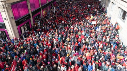 A crowd fills the street