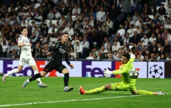 Saka and Martinelli fire Arsenal to last four after famous win at Real Madrid