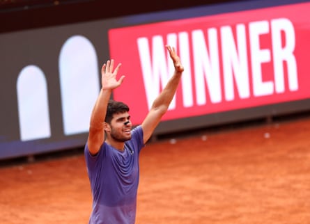 Carlos Alcaraz celebrates after winning his quarter-final match against Britain's Jack Draper.
