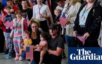 First group of white South Africans arrive in US after Trump grants refugee status