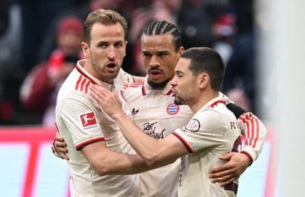 Harry Kane, Leroy Sané and Raphaël Guerreiro celebrate during the March win over St Pauli