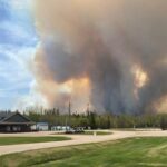 Major Canada wildfire kills two and forces 1,000 people to evacuate homes