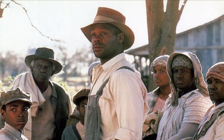 Danny Glover, centre, in Places in the Heart, directed by Benton in 1984.